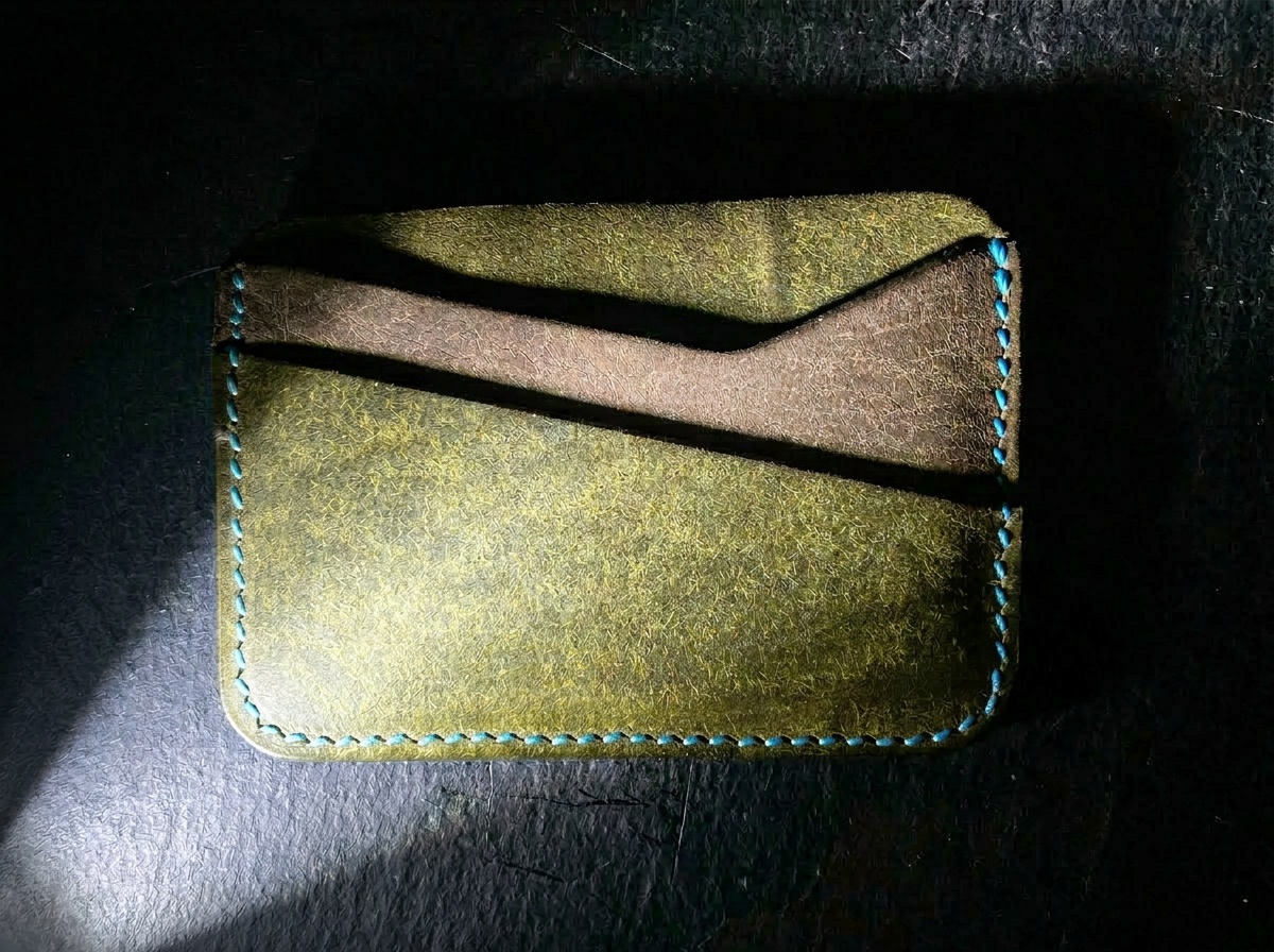The Landscape Card Holder interior showing dual card slots and center cash panel